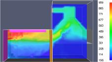 Obr. 4 – Příklad numerického CFD modelu v řezu sledující vývoj kouře s předpokládaným flashoverem; v místnosti dva dřevěné sloupy, jeden dřevěný nosník a stěny obloženy dřevem; zdroj ohně v rohu místnosti o výkonu 300 kW.